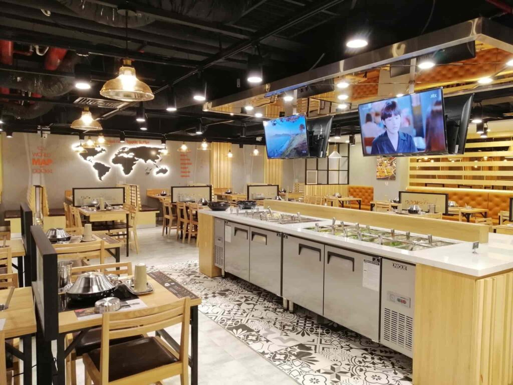 Tầng 5, Vincom Nguyễn Chí Thanh, Dookki - Buffet Lẩu và Mì Cay Hàn Quốc