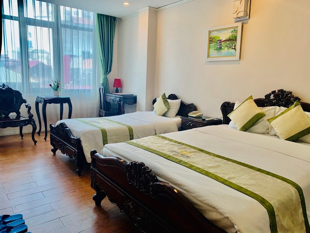 Phòng nghỉ sử dụng nội thất cổ điển của Royal Hotel