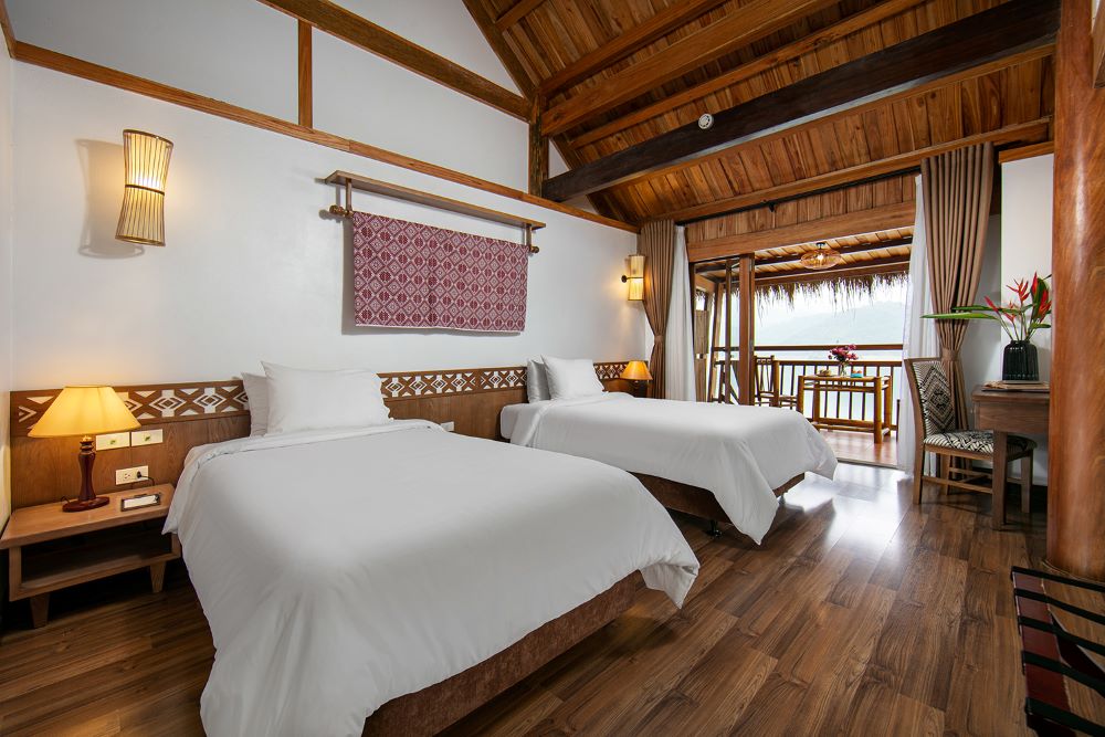 Phòng nghỉ tại Mai Châu Hideaway Lake Resort được thiết kế với kiến trúc đậm chất Rustic 
